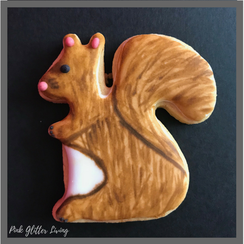 squirrel sugar cookie with royal icing and food color gel painting