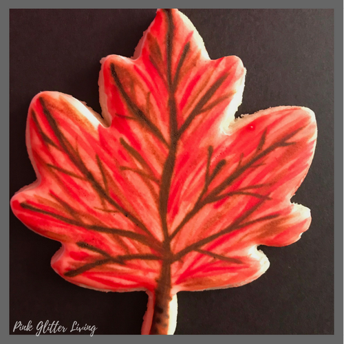 maple leaf cookie with royal icing and food color gel painting