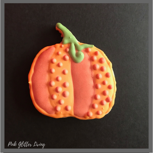 pumpkin cookie with royal icing