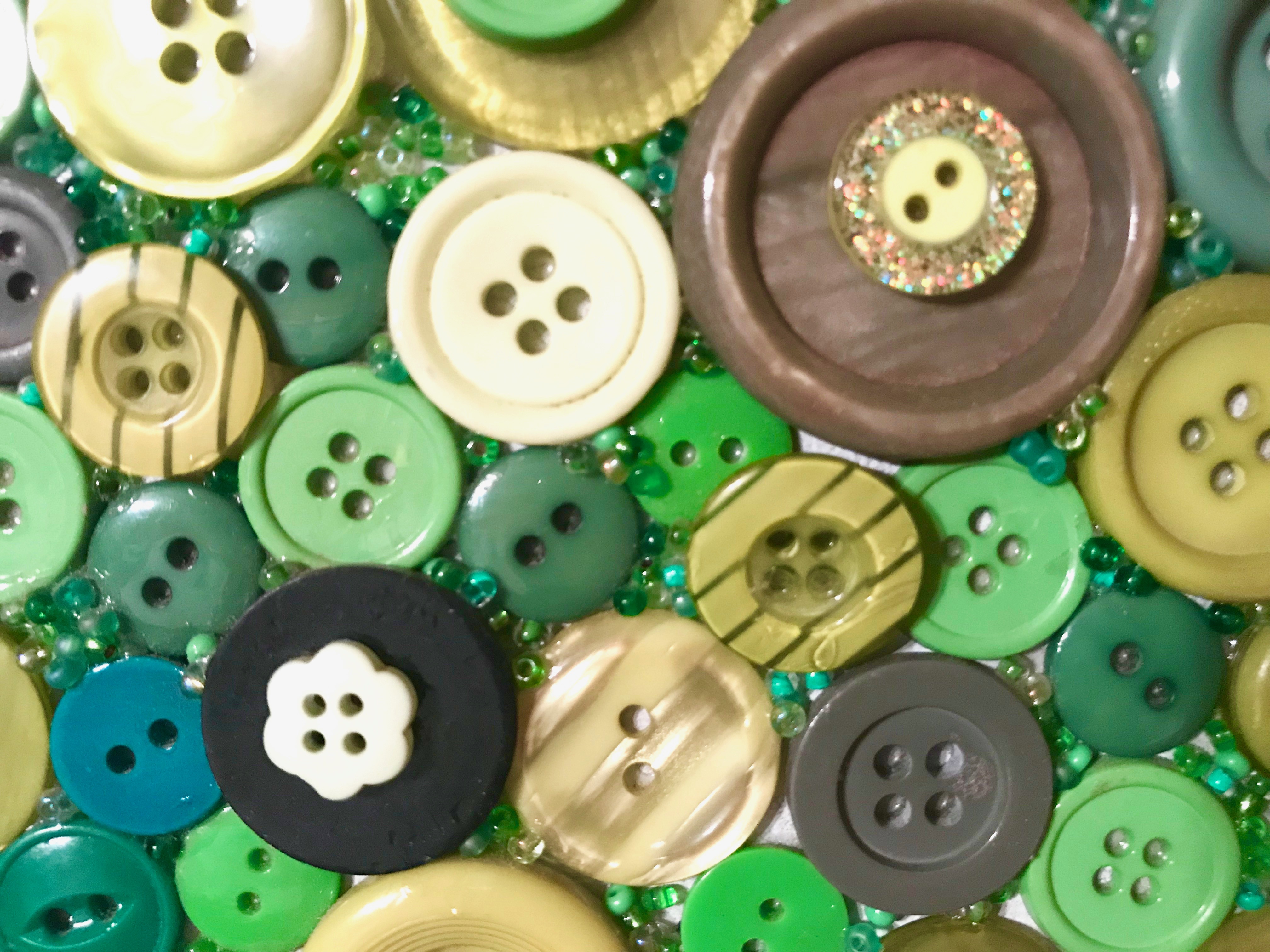 green buttons and seed beads